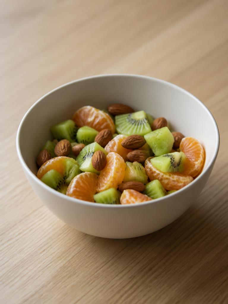 Bol de kiwi, clémentine et amandes