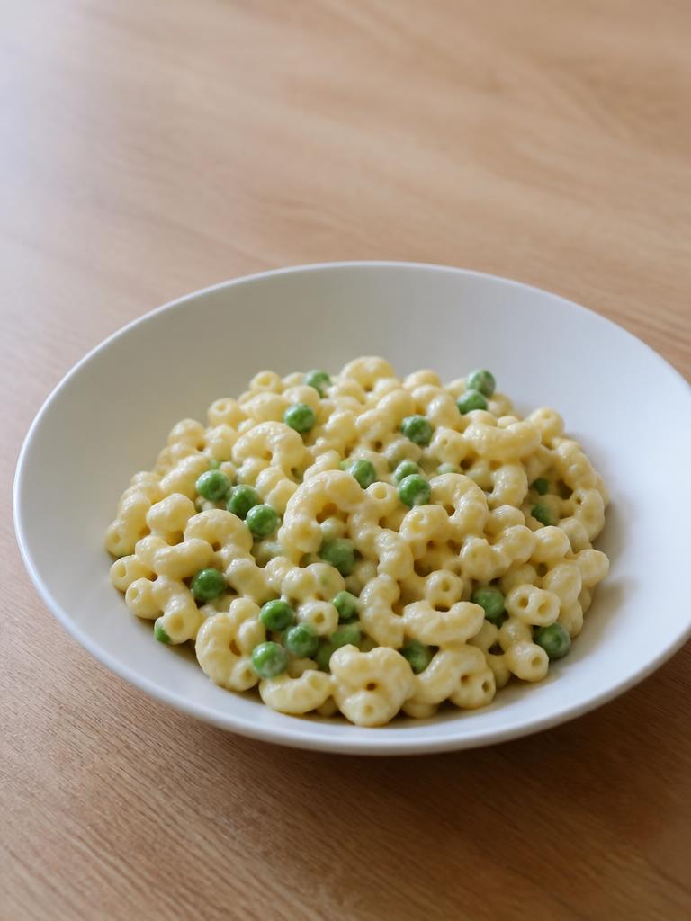 Coquillettes au fromage frais et petits pois