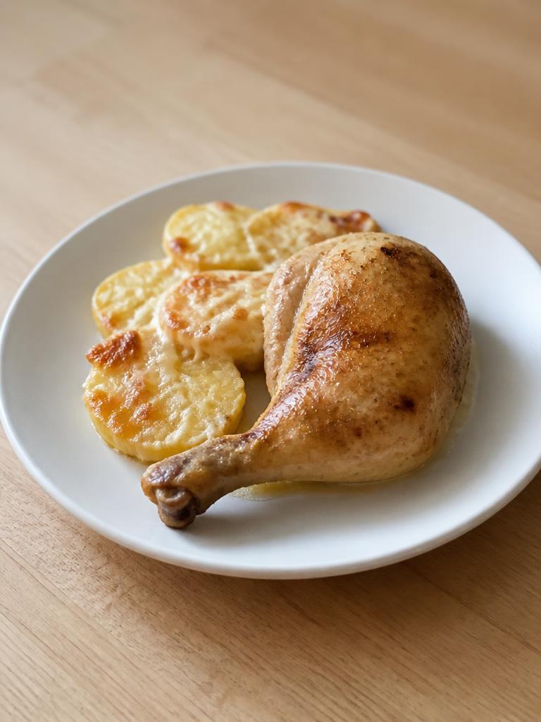 Cuisses de poulet, pommes de terre et emmental fondu