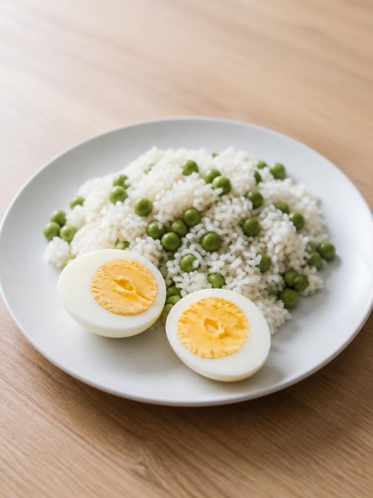 Œufs durs, riz et petits pois