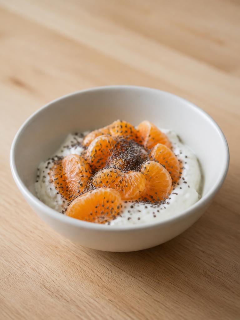 Bol de fromage blanc, clémentines et graines de chia
